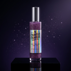 Charlie Charlie Soap Co. Cosmic Stardust Body Oil in a clear cylindrical bottle with a silver cap, filled with sparkling purple oil, displayed on a black pedestal against a dark purple starry background.