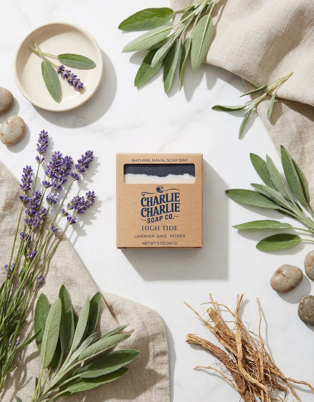 Charlie Charlie Soap Co. bar of soap with lavender and sage leaves on a light background