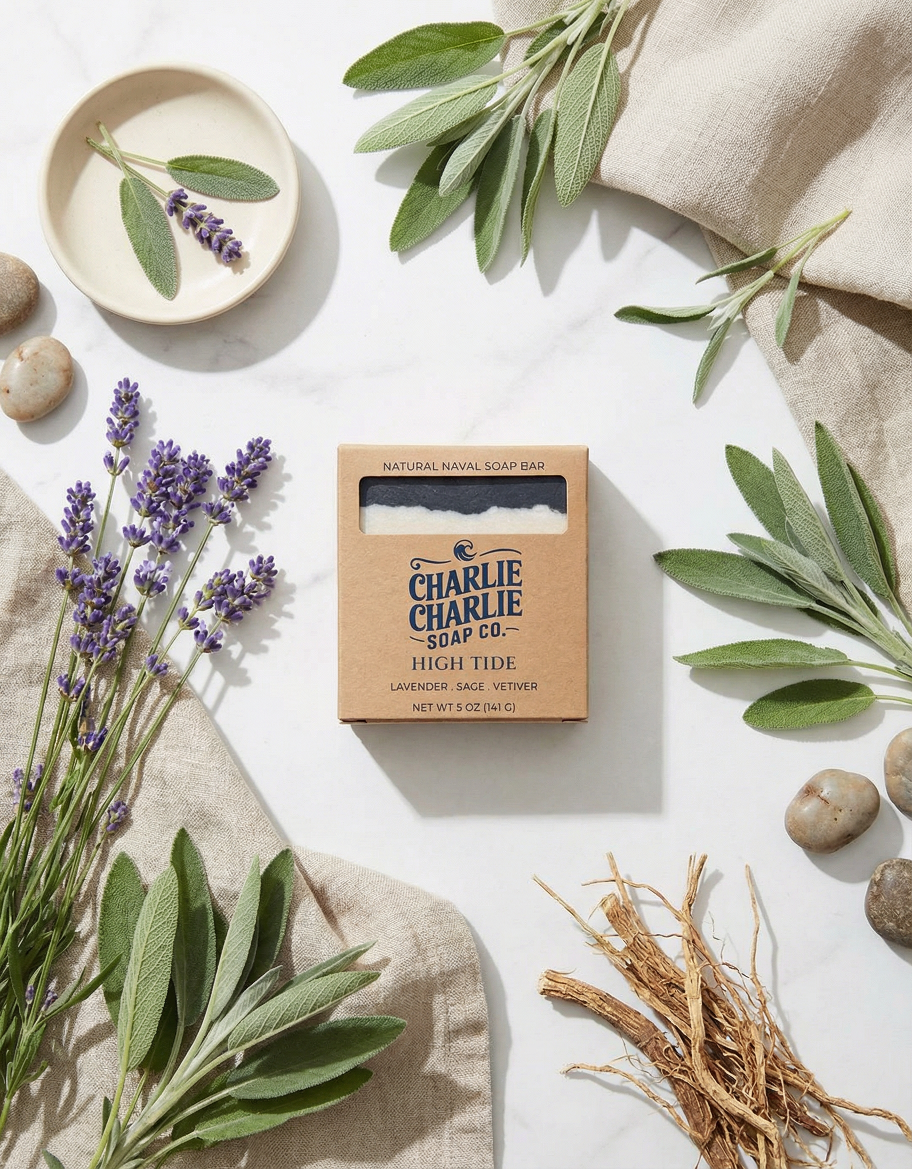 Charlie Charlie Soap Co. bar of soap with lavender and sage leaves on a light background