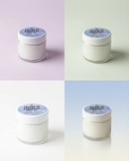 Four containers of Charlie Charlie cream on a gradient background