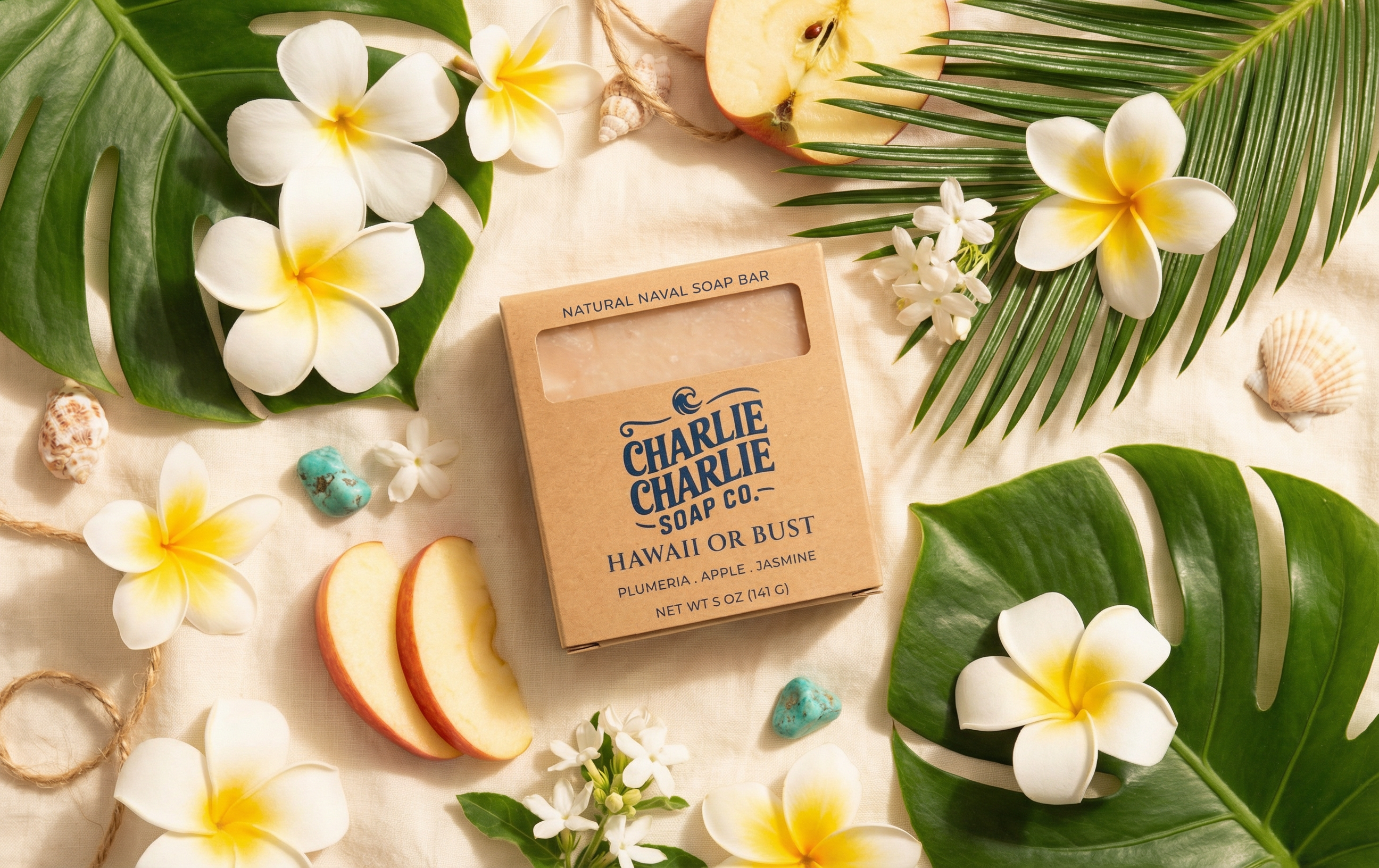 Charlie Charlie Soap Co. bar with tropical flowers and leaves on a light background