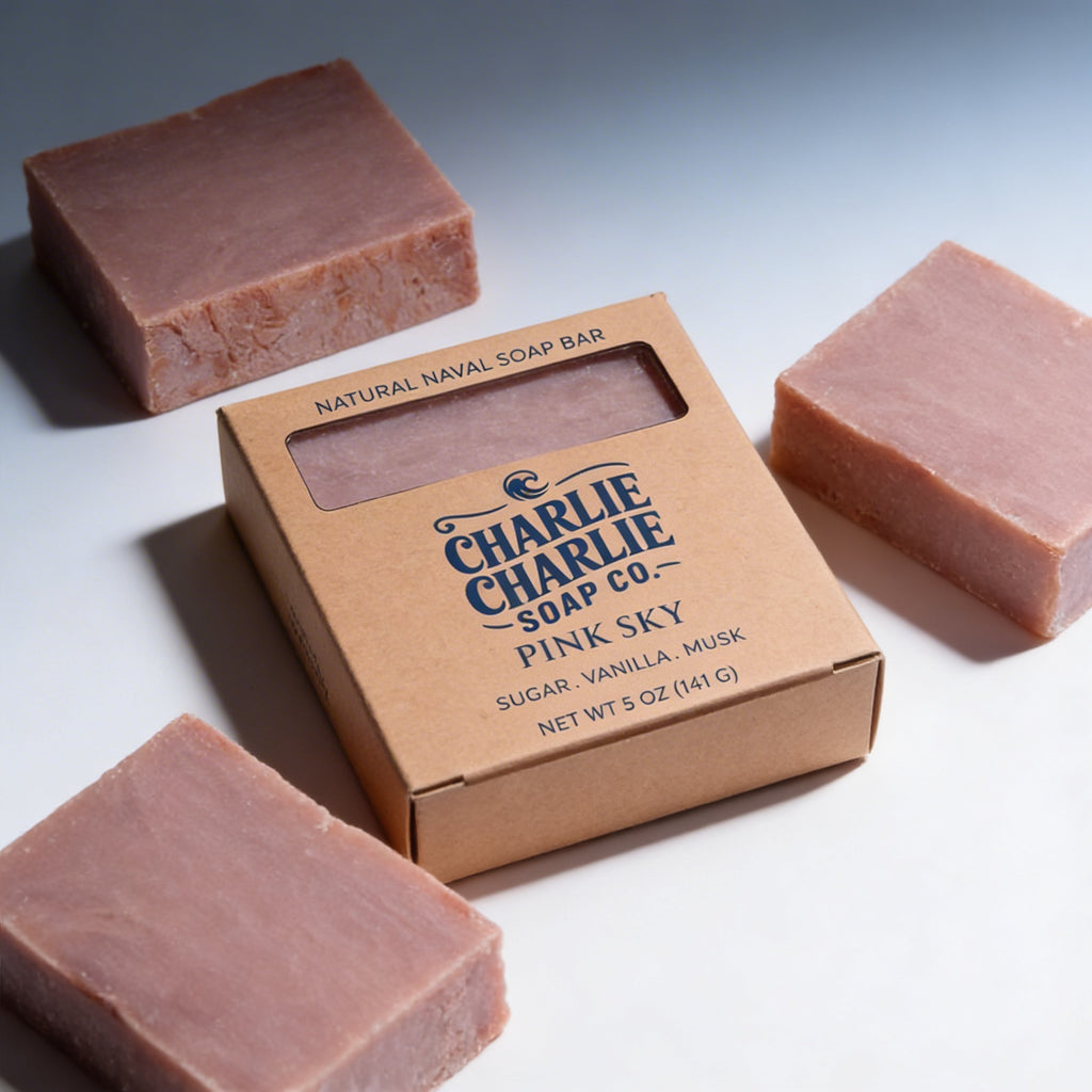 Charlie Charlie Soap Co. pink soap bars with packaging on a light background
